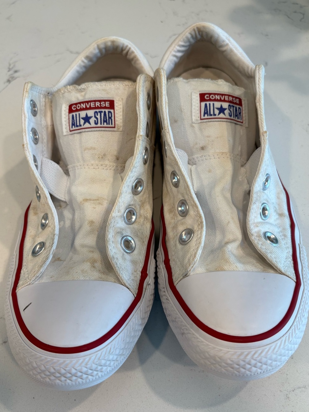 Converse White Canvas Slip-On Sneakers with Red Stripe